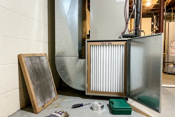 Deep-pleated MERV 13 media filter cabinet installed in a return duct